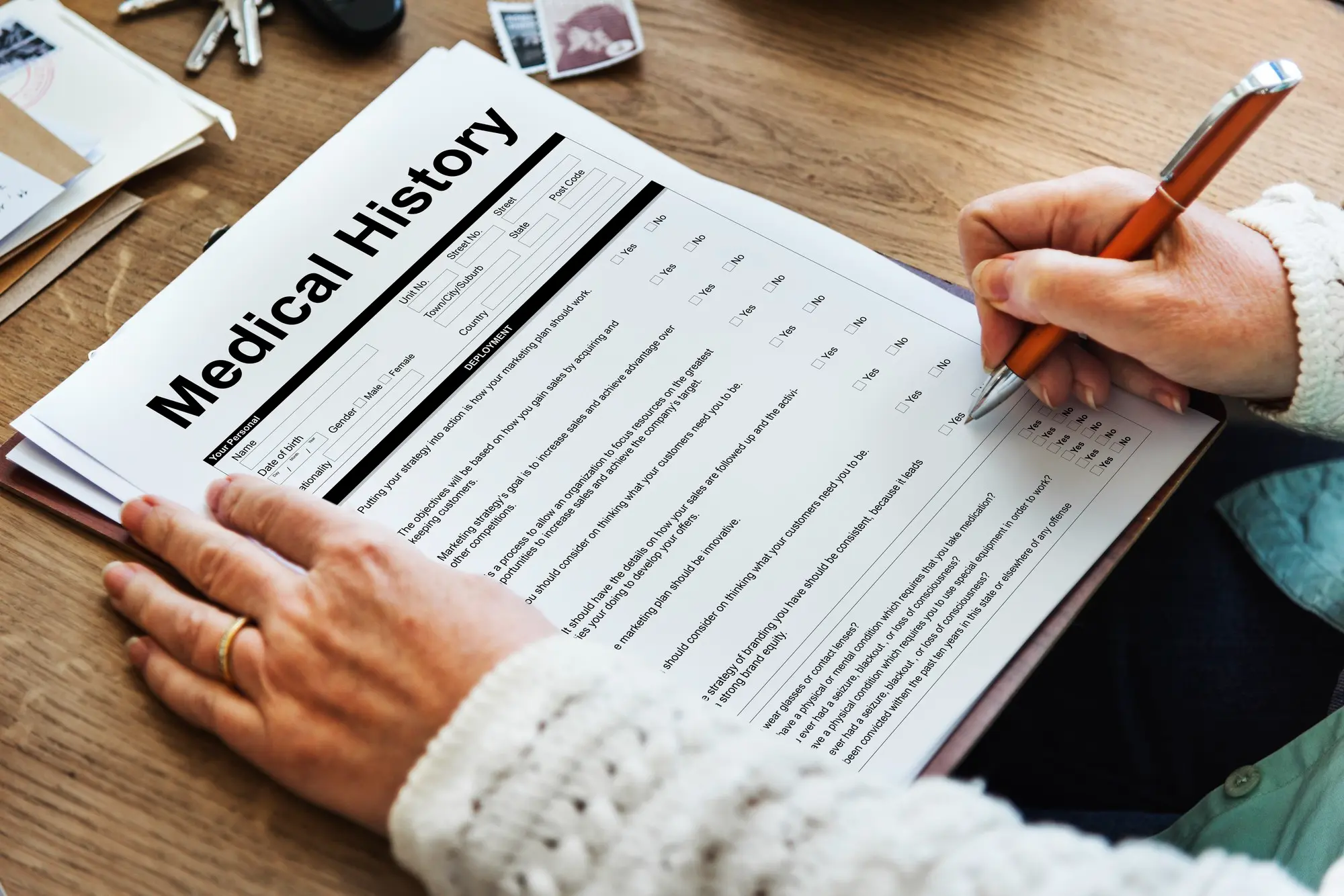 Patient filling medical history form